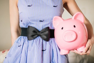 Lady In Stripped Dress With Piggy Bank 701801