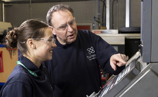 Apprentices - Engineering apprentice on site with employer - at machine