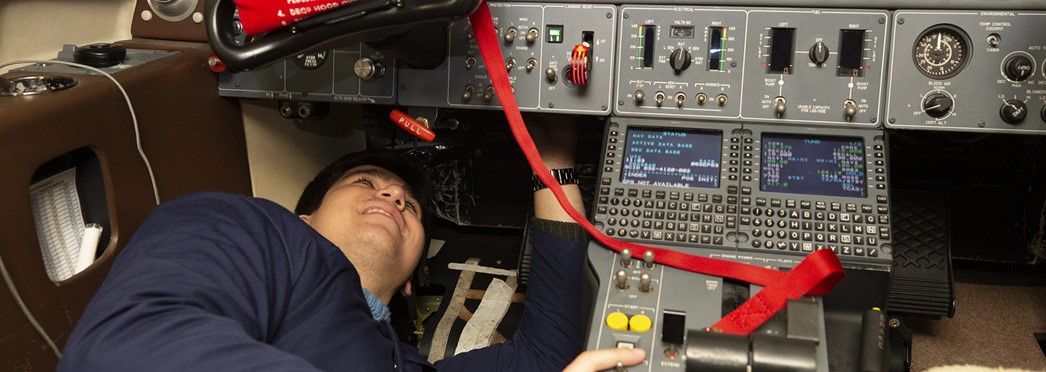 Student Under Cockpit