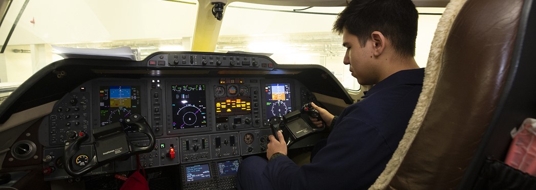 Student In Cockpit Landscape