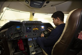 Student In Cockpit Landscape