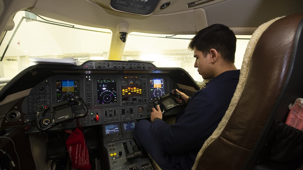 Student In Cockpit Landscape